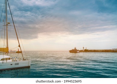 white yacht on the background of the sea evening landscape. berth with a yacht at sunset. - Shutterstock ID 1994523695