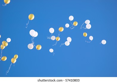 White And Yellow Balloons In The Sky