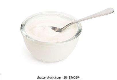 White Yogurt In A Glass Bowl And Spoon Isolated With Soft Shadow