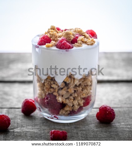 Similar – Chia-Joghurt mit Himbeeren im Glas auf Holz