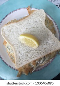 Whitebait Fritter Sandwich With Slice Of Lemon. A New Zealand Delicacy.