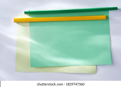 Whiteboard with attached items Adhesive Note and Note Pad