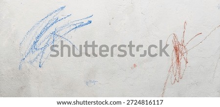 whiteboard background with black line scribbles, photo taken from the front