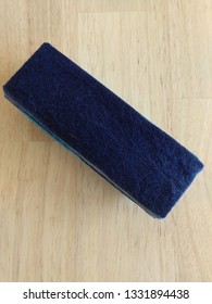 A Whiteboard Duster On A Wooden Table 