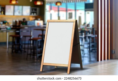 Whiteboard signage stand in front of restaurant - Shutterstock ID 2248256673
