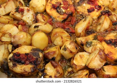 Whitefish Fillets, Potatoes, Tomatoes, And Herbs Are Freshly Cooked In The Oven. Closeup View, Shallow Depth Of Field