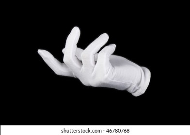 White-gloved hand on a black background