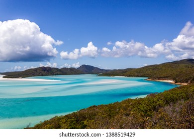 Whiteheaven beach on a beautiful sunny day with clouds, Whitsunday Island, Queensland, Australia
