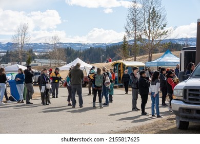 Whitehorse, Yukon, Canada - May 12, 2022: The first day of Fireweed Community Market in Shipyards Park this year attracted many people to come and visit.