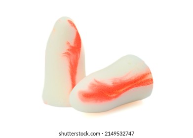 White-orange Earplugs Isolated On White Background.Close-up.Soft Foam Earplug