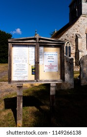 Whiteparish, Wiltshire, England - July 31, 2018: Notice Board At All Saints Parish Church In The Church Of England Diocese Of Salisbury, Building Dating Back To Circa 1190