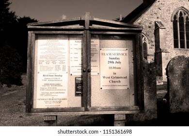 Whiteparish, Wiltshire, England - July 31, 2018: Sepai Notice Board At All Saints Parish Church In The Church Of England Diocese Of Salisbury, Building Dating Back To Circa 1190