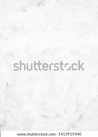 Whitewashed plaster wall with brushes traces, white background and texture