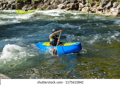 Whitewater Canoe Paddler Paddling Upstream