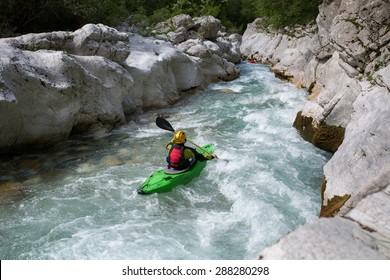 Whitewater Kayaking Down The Rapids