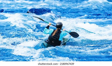 Whitewater Kayaking, Extreme Sport Rafting. Young Woman In Kayak Sails Mountain River.