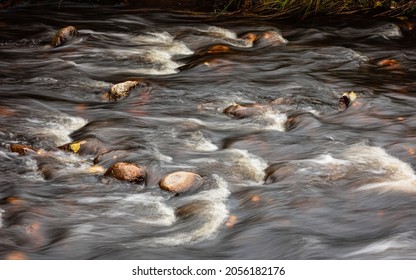 A Whitewater Rapid In Southern Finland On A Bright Autumn Day