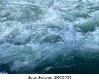 Whitewater Rapids Churn In The Kootenai River. Montana.