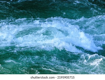 Whitewater Splashing In Strong River Current