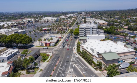 Whittier, California / USA - May 16, 2020: Traffic Passes Down Whittier Boulevard Through Whittwood Area Of Whittier, California.