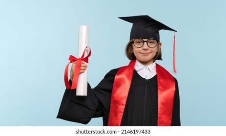 Whizz kid 9-11 year girl wearing graduation cap, round eyewear and ceremony robe with certificate diploma on light blue background. Graduate celebrating graduation. Education Concept. Success - Shutterstock ID 2146197433