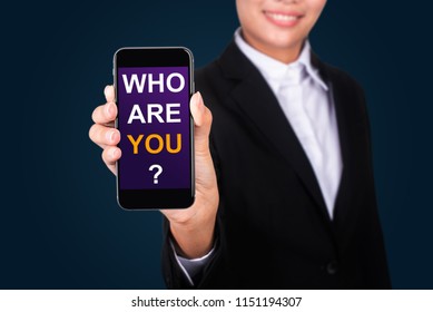 Who Are You?, Happy businesswoman Show text Who Are You? on smart phone
