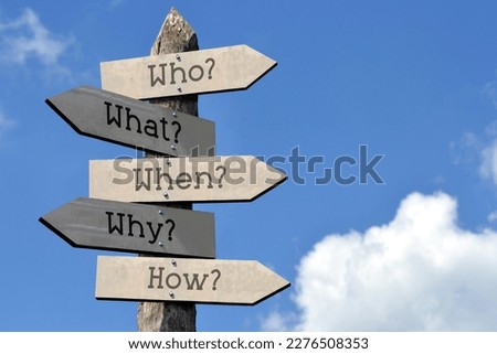 Who, what, when, why, how - wooden signpost with five arrows, sky with clouds
