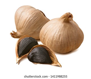 Whole black garlic bulbs and cloves isolated on white background. Package design element with clipping path