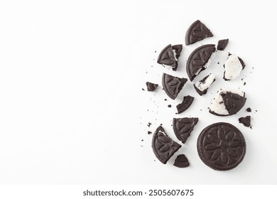 Whole and broken tasty sandwich cookies on white background, flat lay. Space for text - Powered by Shutterstock