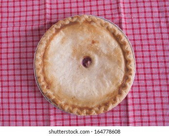 Whole Cherry Pie In Baking Tin.