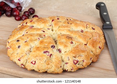 Whole Cranberry Scone On A Cutting Board