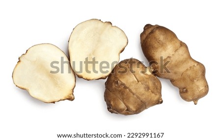 Whole and cut Jerusalem artichokes isolated on white, top view [[stock_photo]] © 
