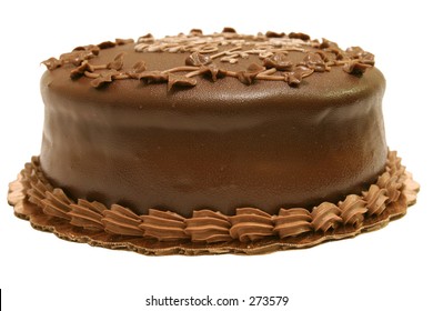 A Whole Dark Chocolate Cake Isolated Against A White Background.