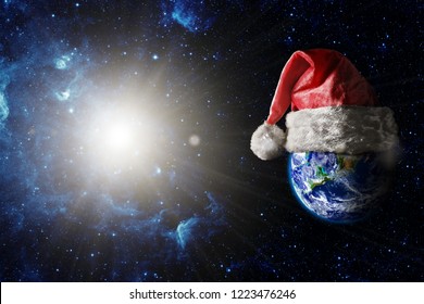 The whole earth for christmas is wearing a santa hat on the cosmos backgrounds
Elements of this image furnished by NASA