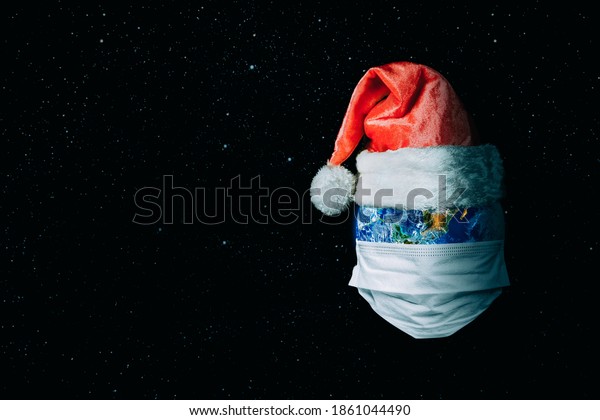 The\
whole earth is quarantined for christmas is wearing a mask on the\
cosmos backgrounds\
Coronavirus and Air pollution pm2.5 concept.\
COVID-19\
Elements of this image furnished by\
NASA