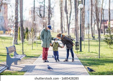 The Whole Family Outdoor Wearing Masks