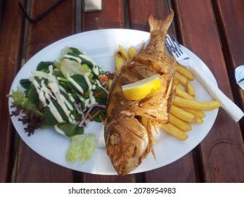 Whole Fish With Fries And Salad