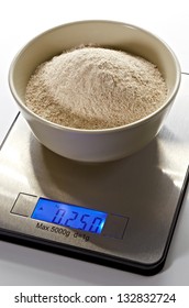 Whole Flour In Bowl On Kitchen Scale