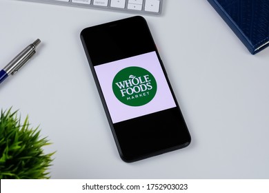 Whole Foods Market app logo on a smartphone screen. Manhattan, New York, USA May 2, 2020.