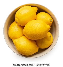 Whole fresh lemons in light rustic bowl isolated on white. Top view. - Powered by Shutterstock