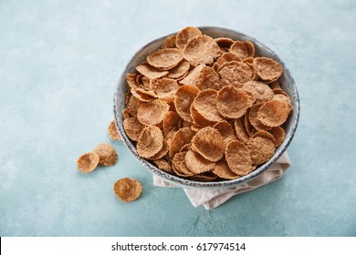 Whole Grain Cereal In A Bow On A Blue Background