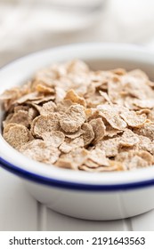 Whole Grain Cereal Flakes. Wholegrain Breakfast Cereals In Bowl On A Kitchen Table.