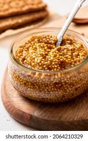 Whole Grain Mustard In A Glass Jar Close-up.