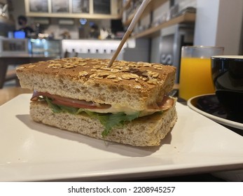 Whole Grain Sandwich With Ham, Gouda Cheese, Lettuce And Tomato