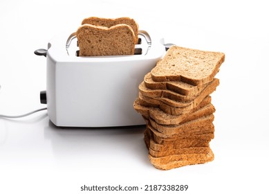 Whole Grain Toast Bread And Toaster. Isolate On White Background 