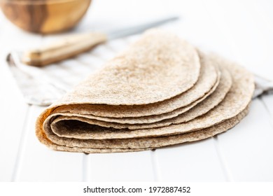 Whole Grain Tortilla Wraps On White Table.