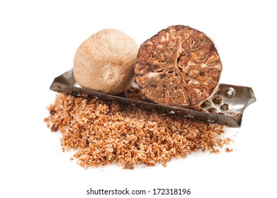 Whole And Grated Nutmeg On White Background