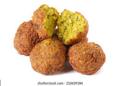 whole and half falafel isolated on a white background closeup  