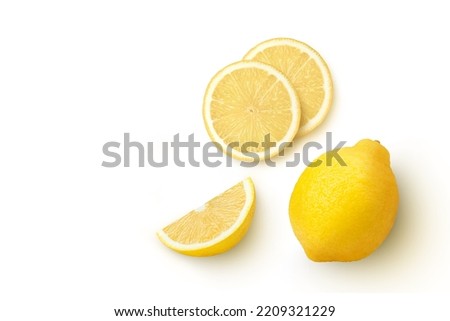 Whole and half sliced lemon isolated on white background. Top view. Flat lay.