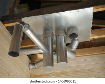 Whole House Air Ventilation And Cleaning System. Ventilation Metal Pipes In Silver Insulation Material And Roof Ferm